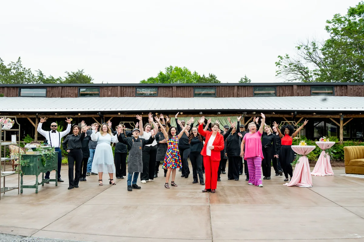 catered affair wedding staff celebration nashville venue - About A Catered Affair A Catered Affair wedding catering staff celebrating with raised hands at Nashville wedding venue