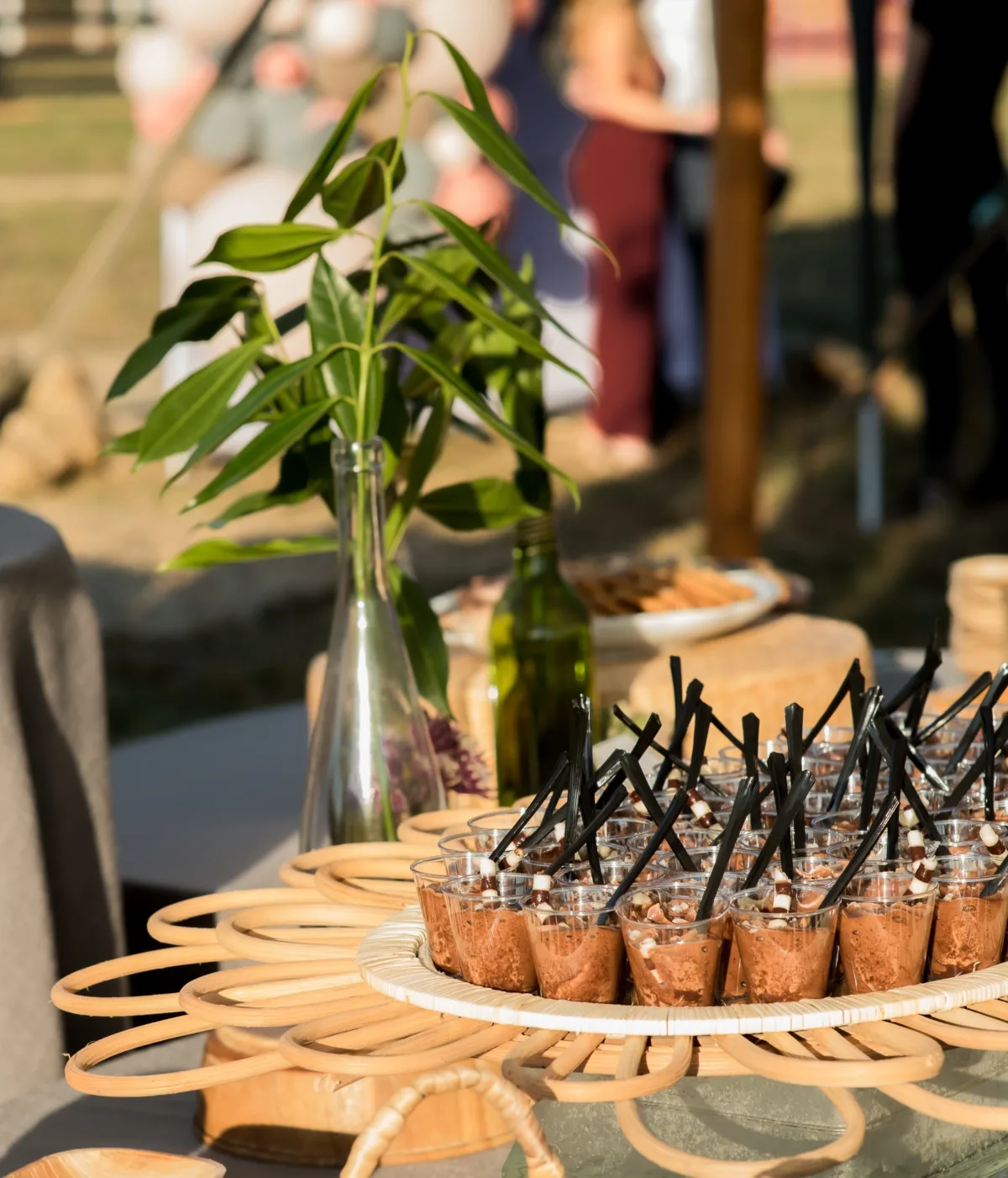 chocolate mousse dessert cups catered affair nashville wedding - Desserts Elegant chocolate mousse dessert cups with black straws served by A Catered Affair at Nashville wedding reception