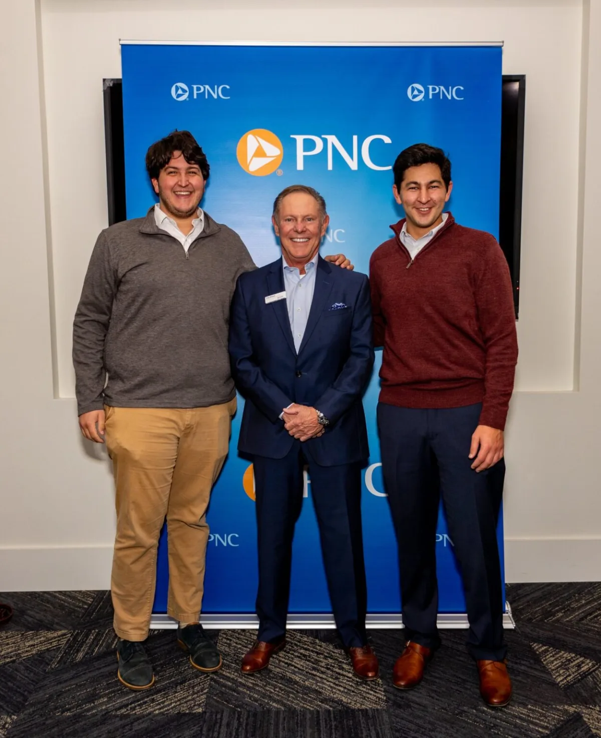 Nashville corporate event catering by A Catered Affair at PNC Bank professional networking gathering with three business professionals