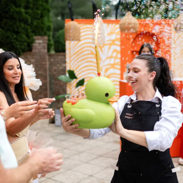 Nashville private event with interactive bubble game entertainment catered by A Catered Affair