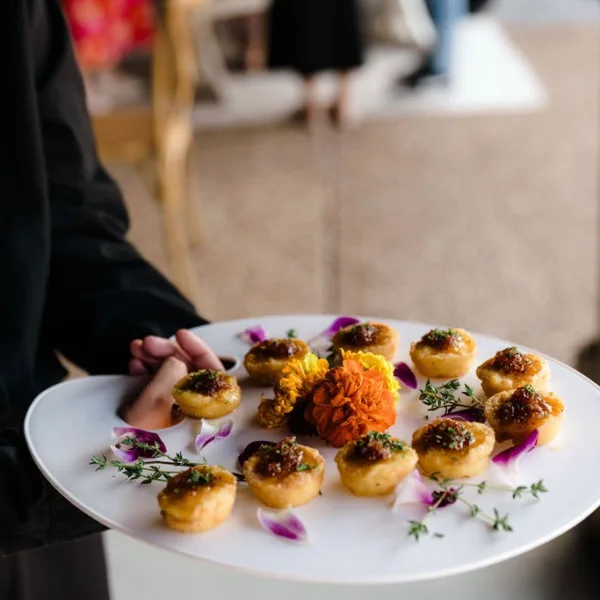 Elegant wedding appetizers with garnish served by A Catered Affair Nashville wedding caterer