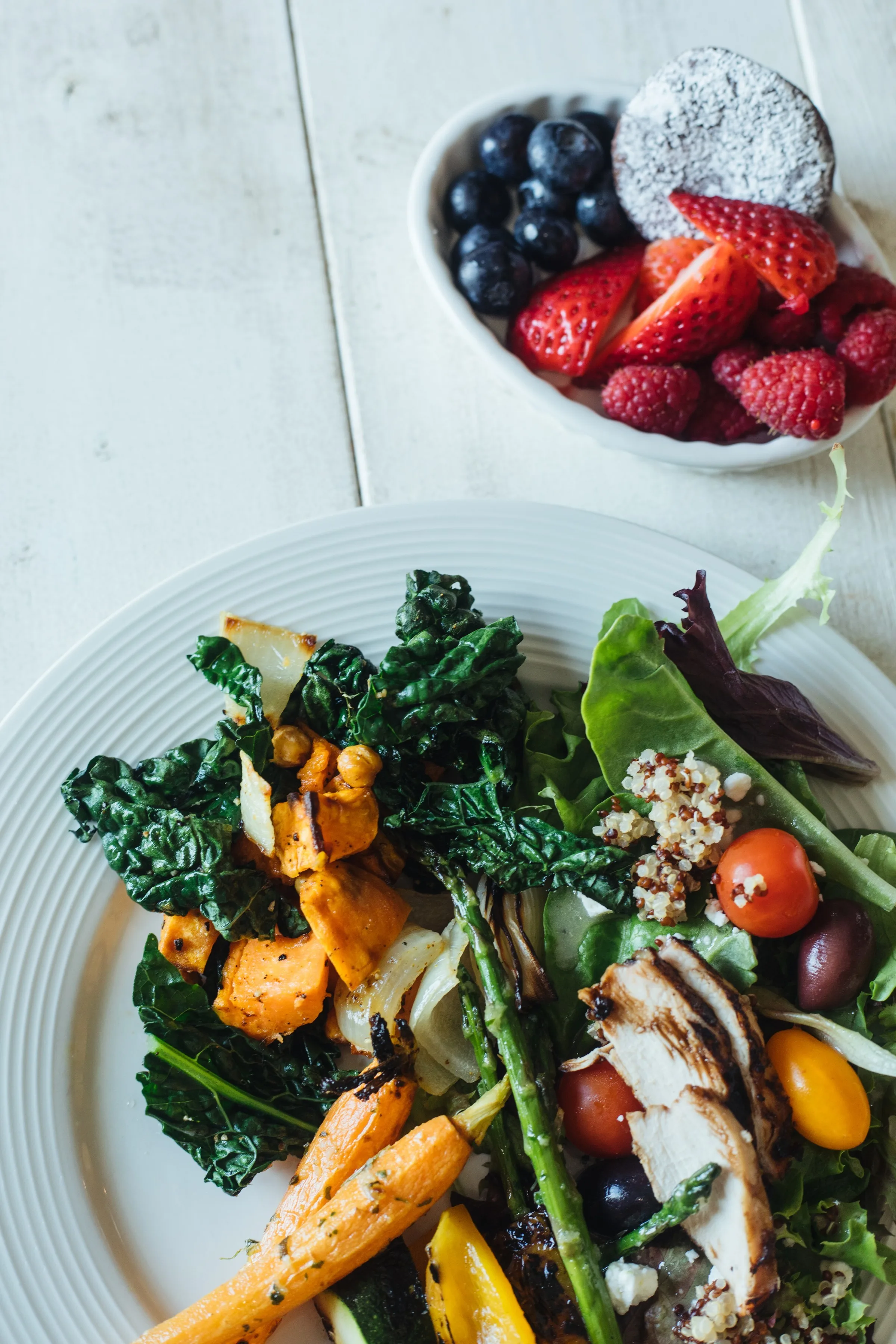 Fresh kale and roasted vegetable salad with mixed greens and berry bowl by Nashville wedding caterer A Catered Affair