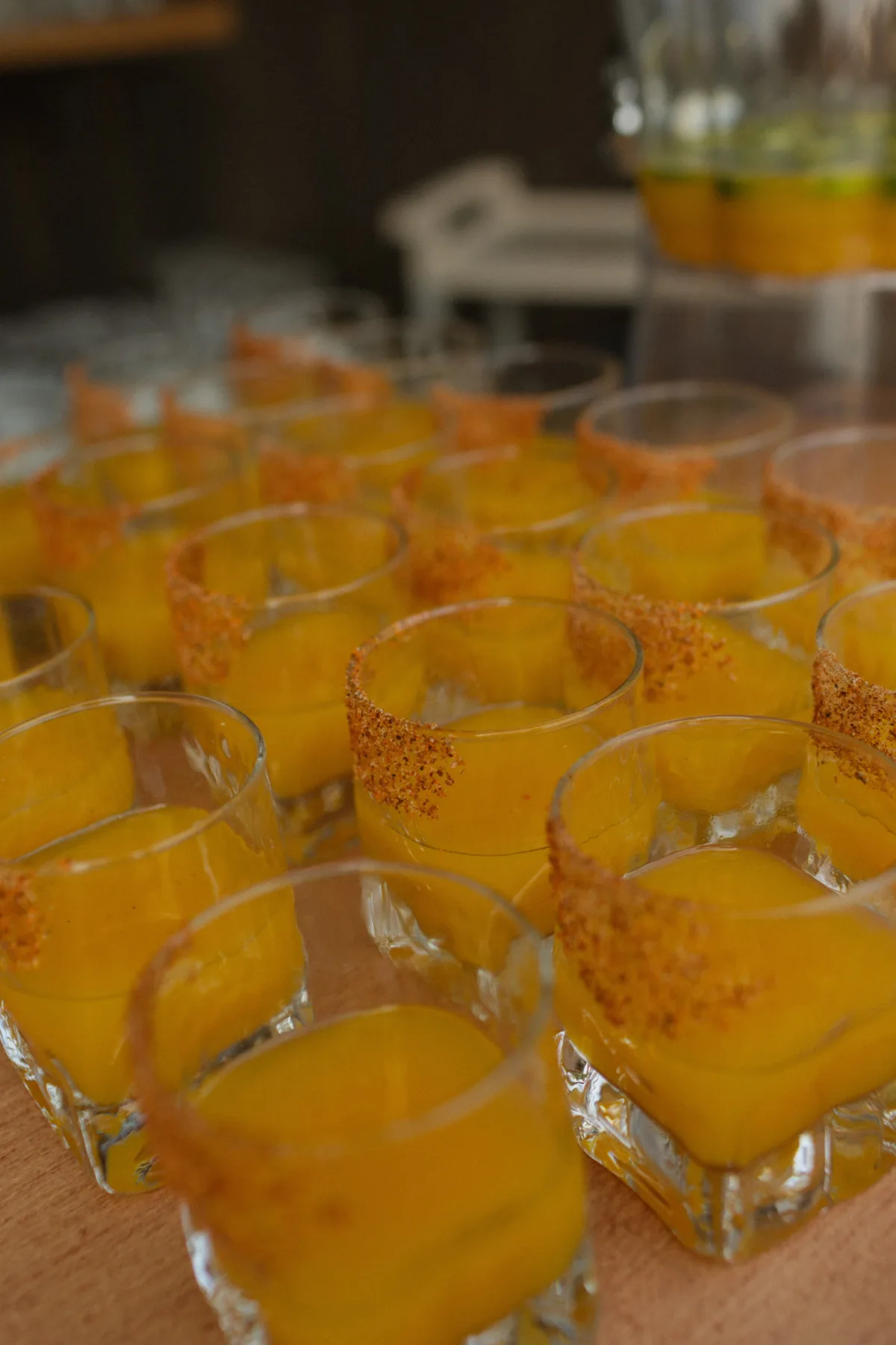 Spiced rim cocktails with orange garnish prepared by Nashville wedding caterer A Catered Affair for elegant wedding reception service