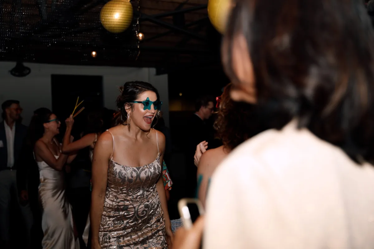 Wedding guests dancing and celebrating at Nashville reception catered by A Catered Affair