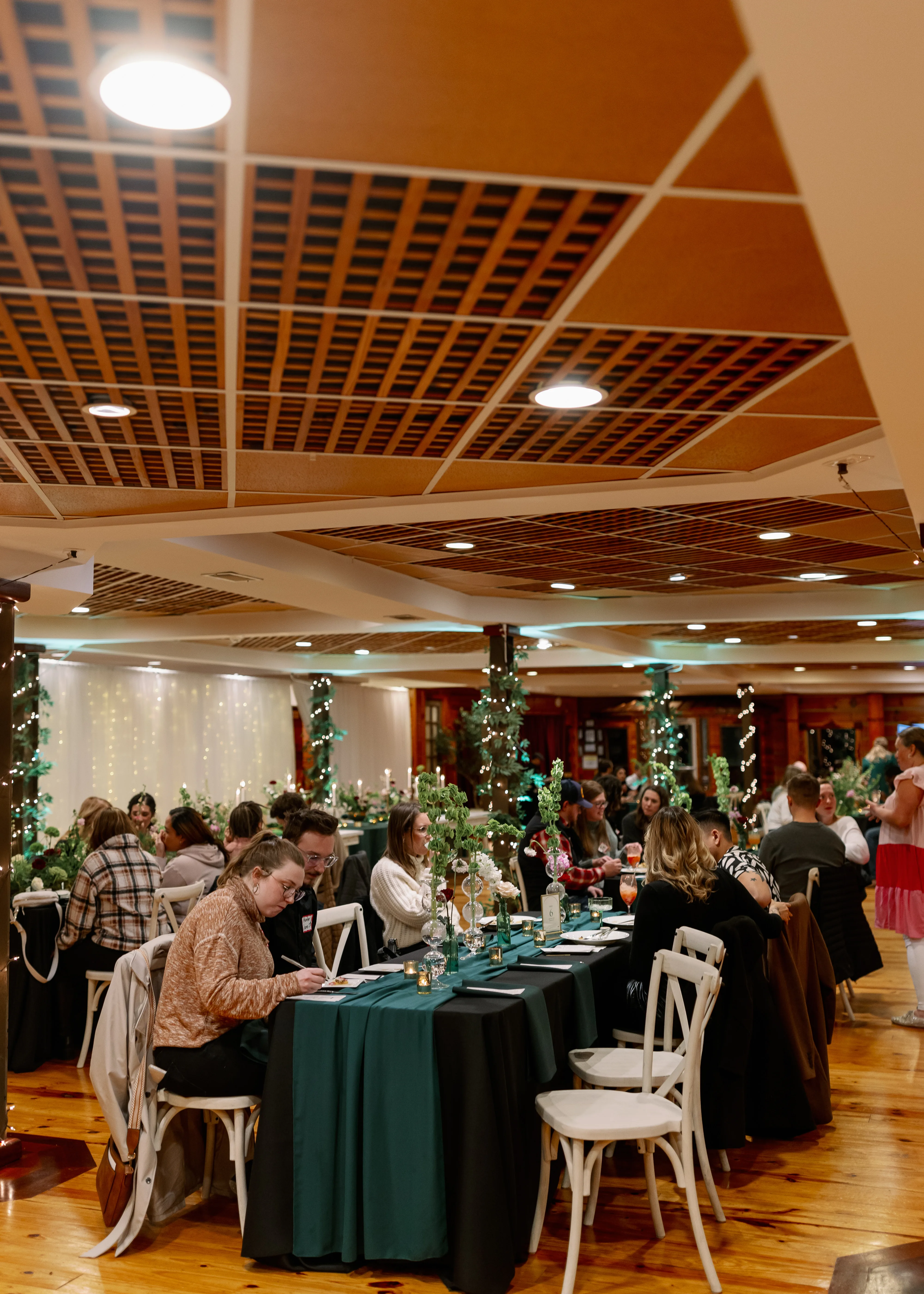 nashville wedding reception dinner tables a catered affair - Nashville Wedding Catering Wedding reception dinner with elegant green table linens and floral centerpieces catered by A Catered Affair in Nashville