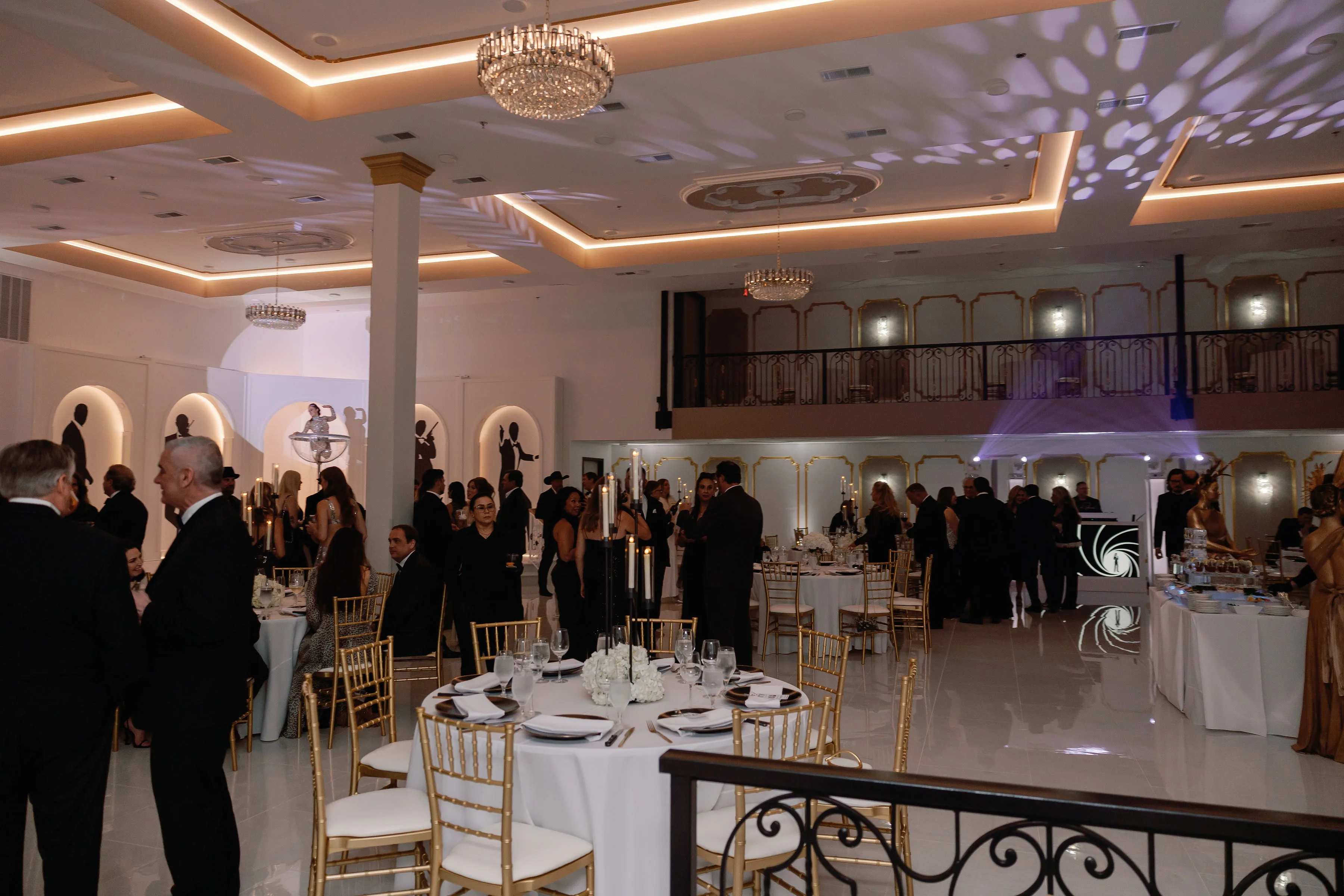Elegant private event reception with formal dining setup and crystal chandeliers catered by A Catered Affair in Nashville
