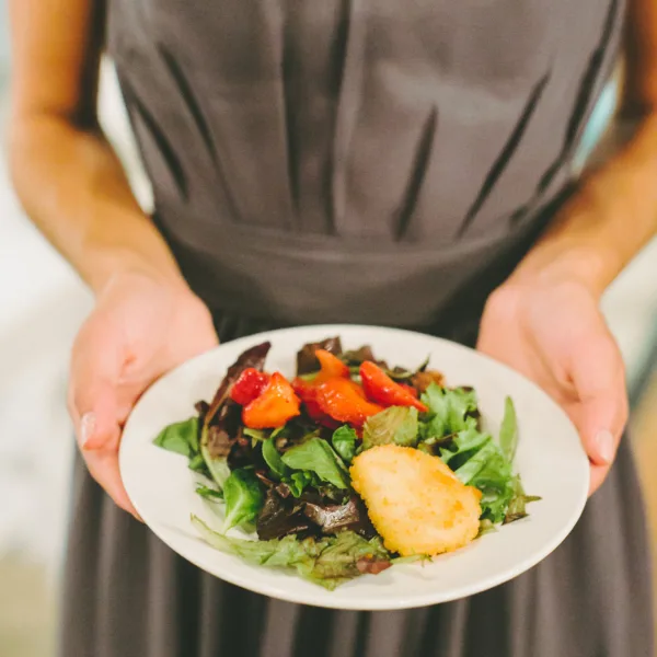 Fresh salad with roasted vegetables and artisanal cheese served by Nashville wedding caterer A Catered Affair